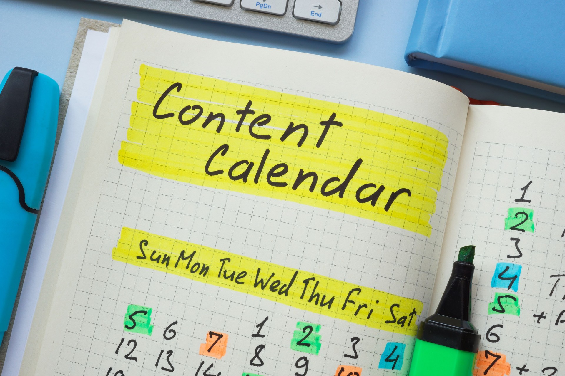 Open notebook with content calendar written.