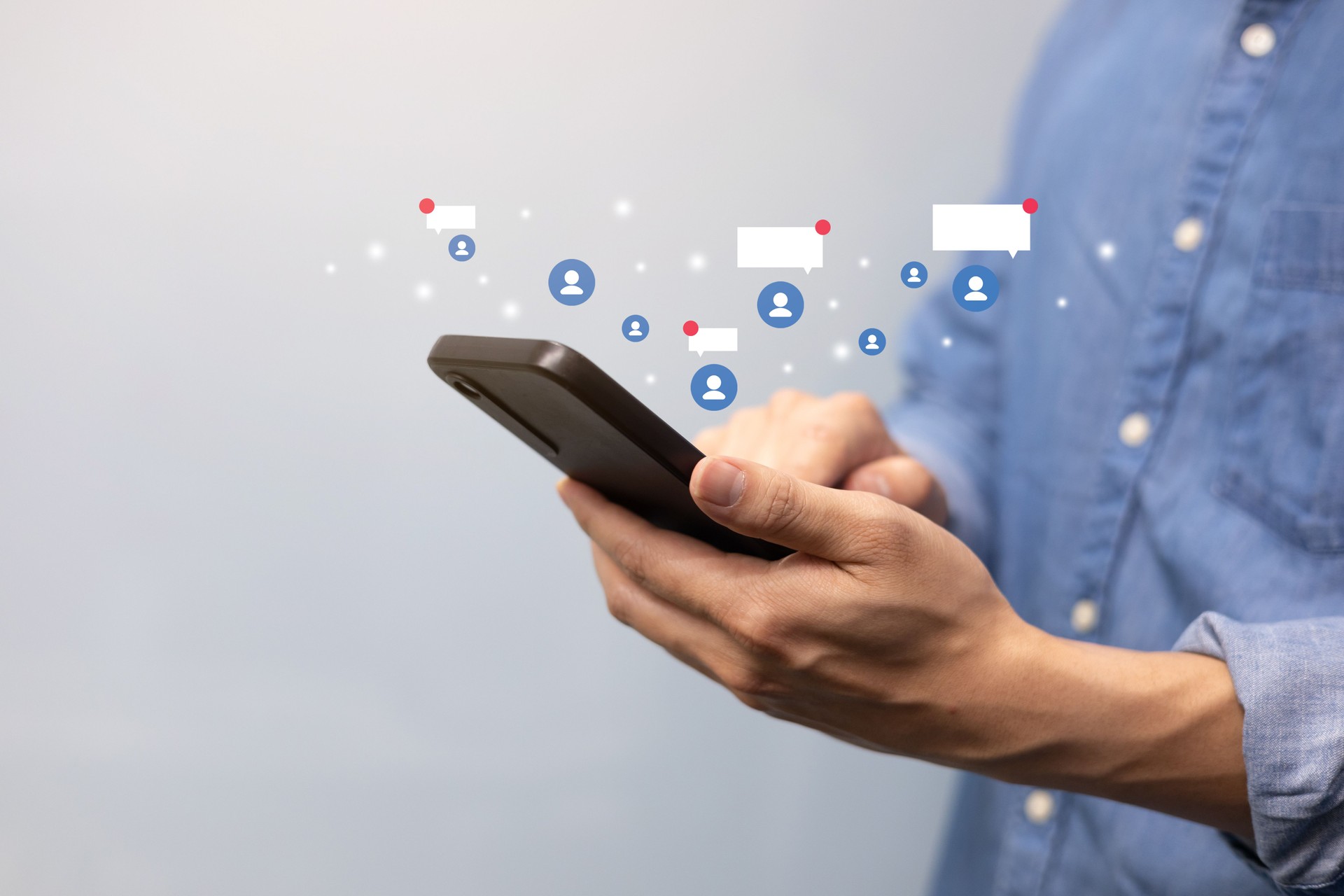 close up young man hand hold smartphone and use social media application to connect and talk with friend or follower for modern lifestyle and technology trend concept